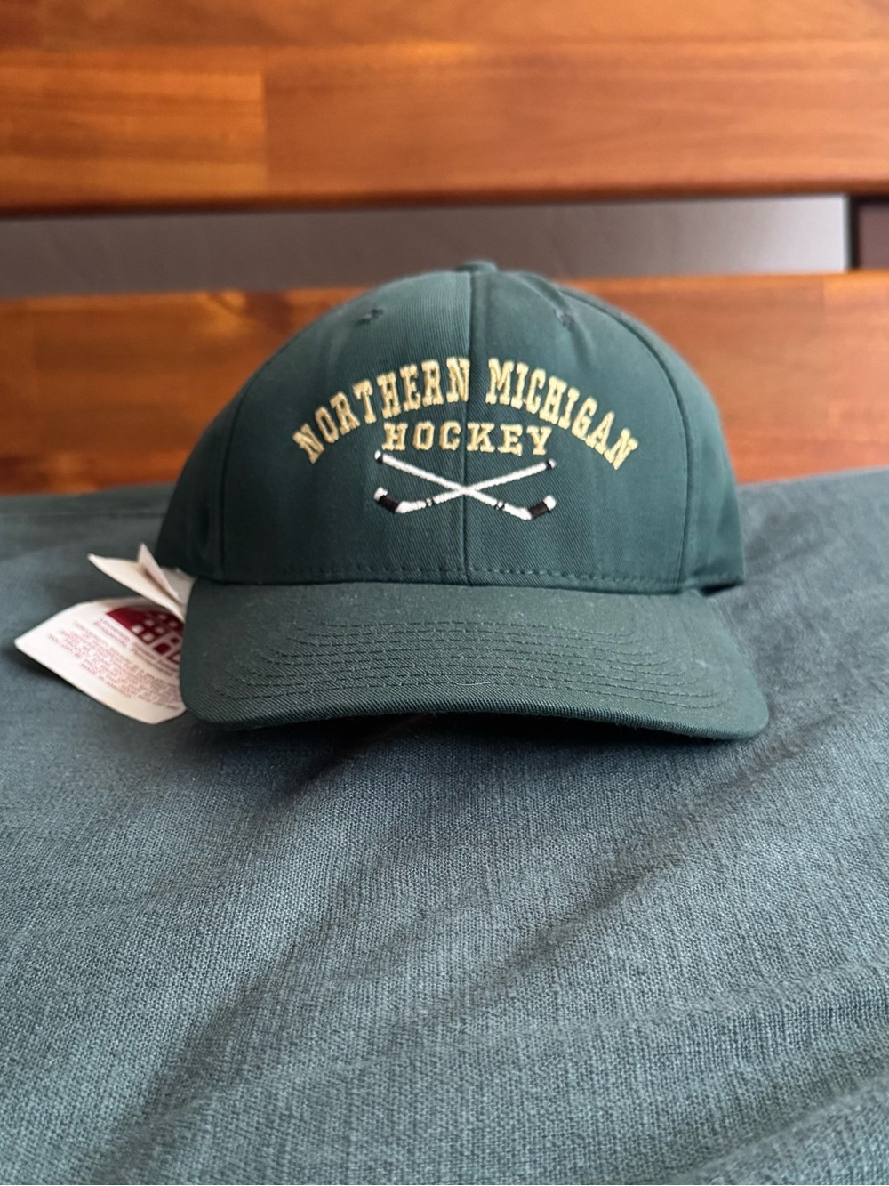 NORTHERN MICHIGAN University Hockey Adjustable Dark Green Baseball Cap